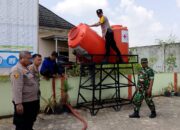 Bentuk Rasa Kepedulian Polsek Indralaya Berikan Bantuan Air Bersih di Desa Palem raya